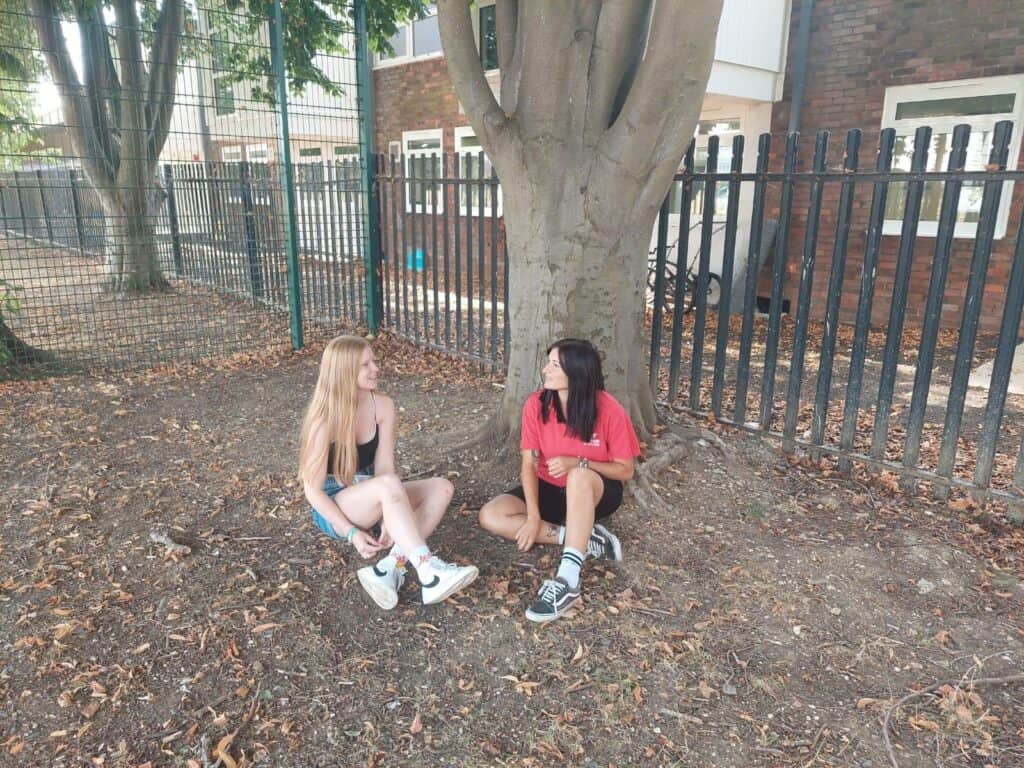 Photo of a young person engaging in mentoring with a trusted adult