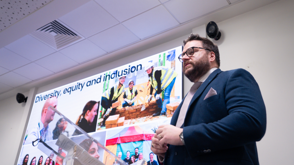 Photo of NHBC employee presenting to young people
